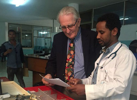 Dr. Koning in Ethiopia talking to another health care professional