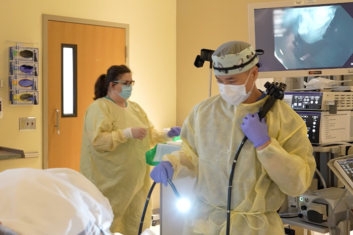 physician using scope in the operating room