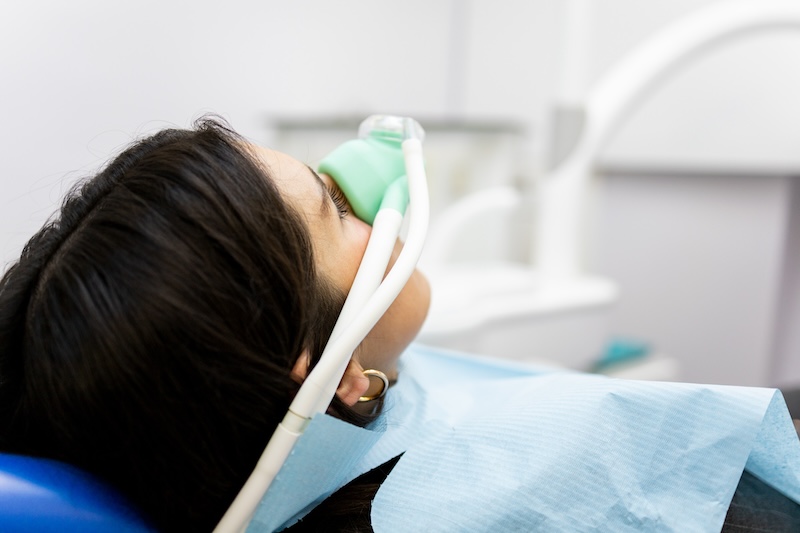 A patient wearing a nitrous oxide mask