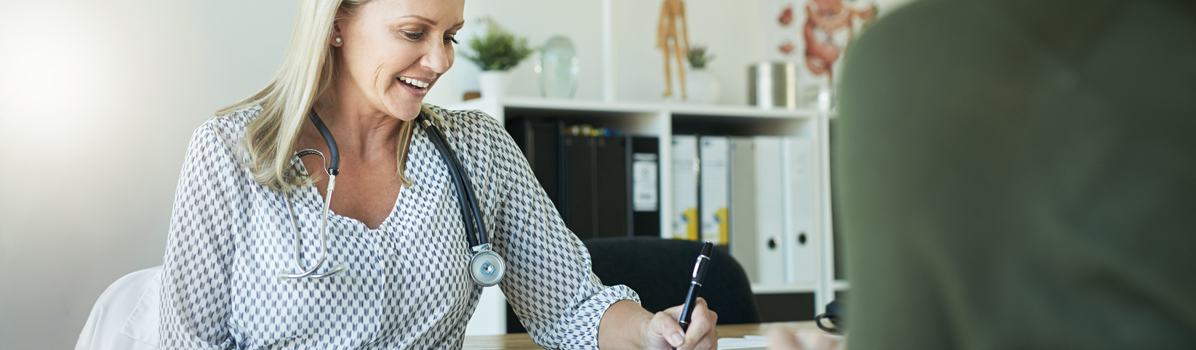 female doctor consulting patient