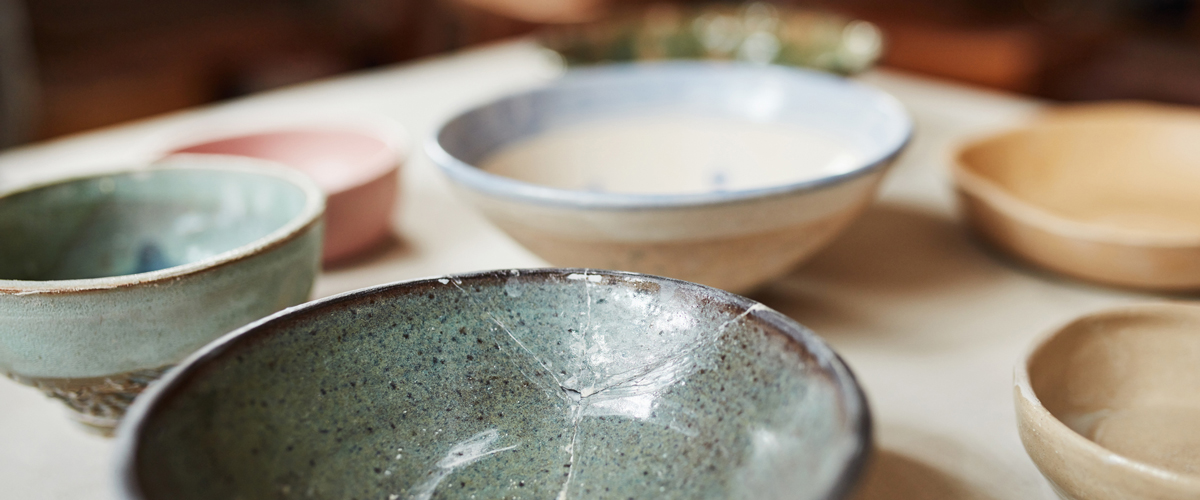 table full of empty bowls