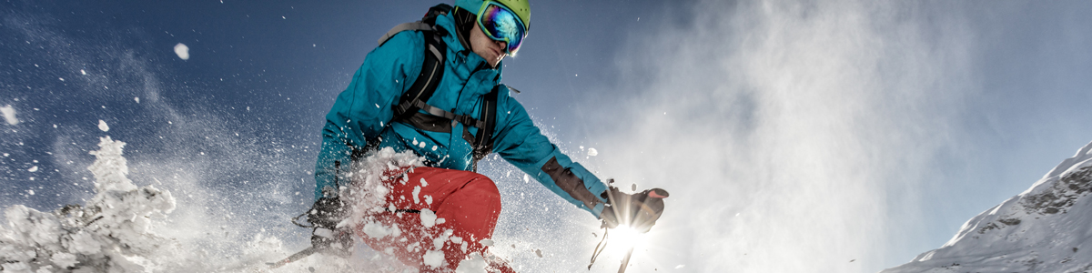 skier on mountain in thick snow