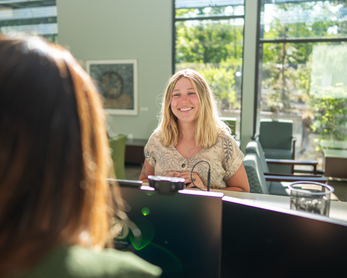 patient checking in at front desk